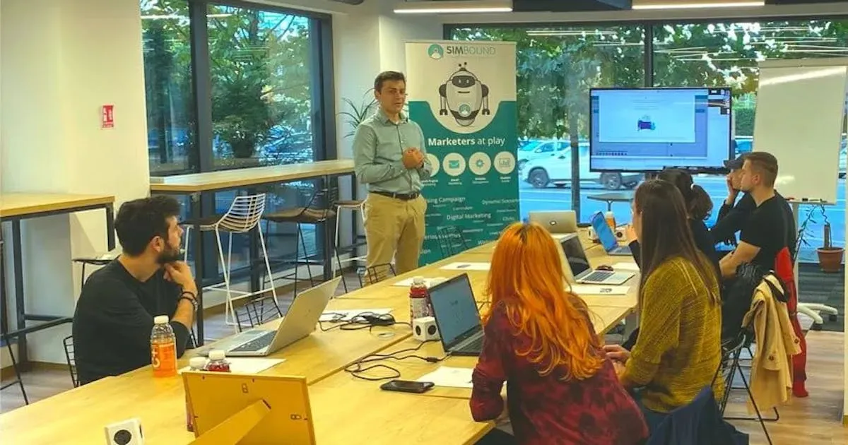 picture of Louis Havriliuc, Simbound founder with participants at a Simbound workshop