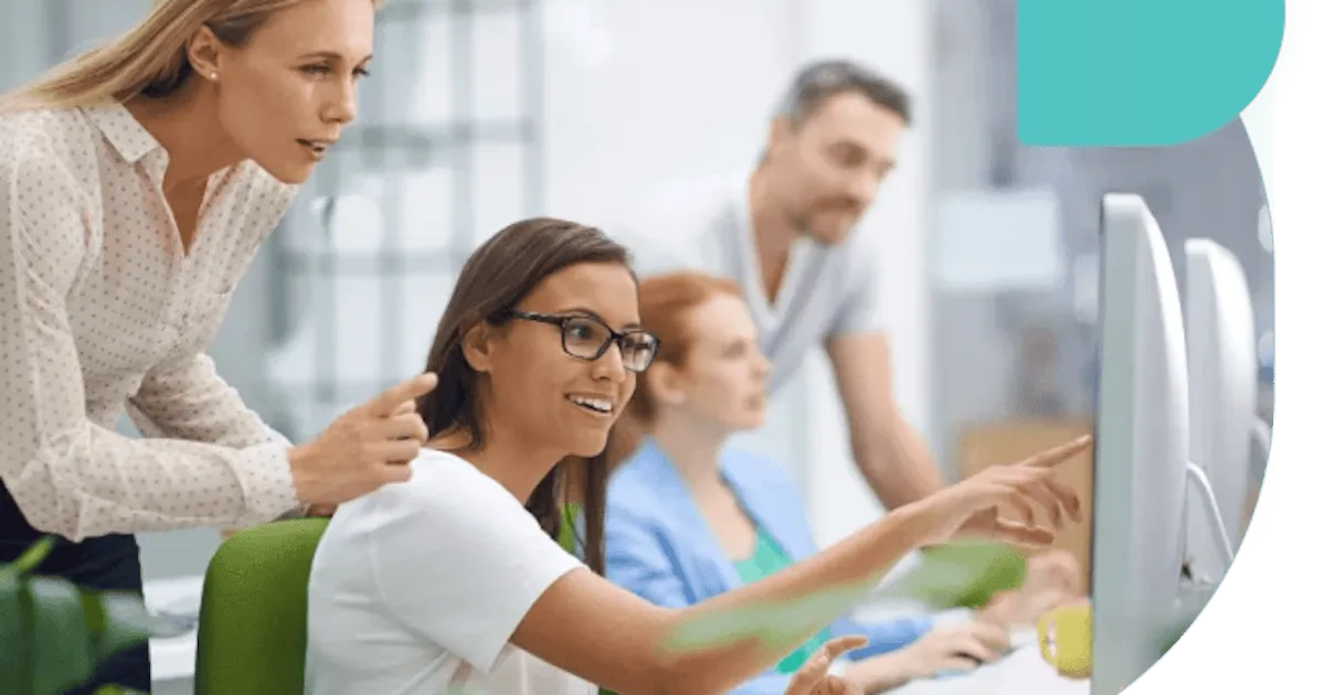 image of persons looking towards screen