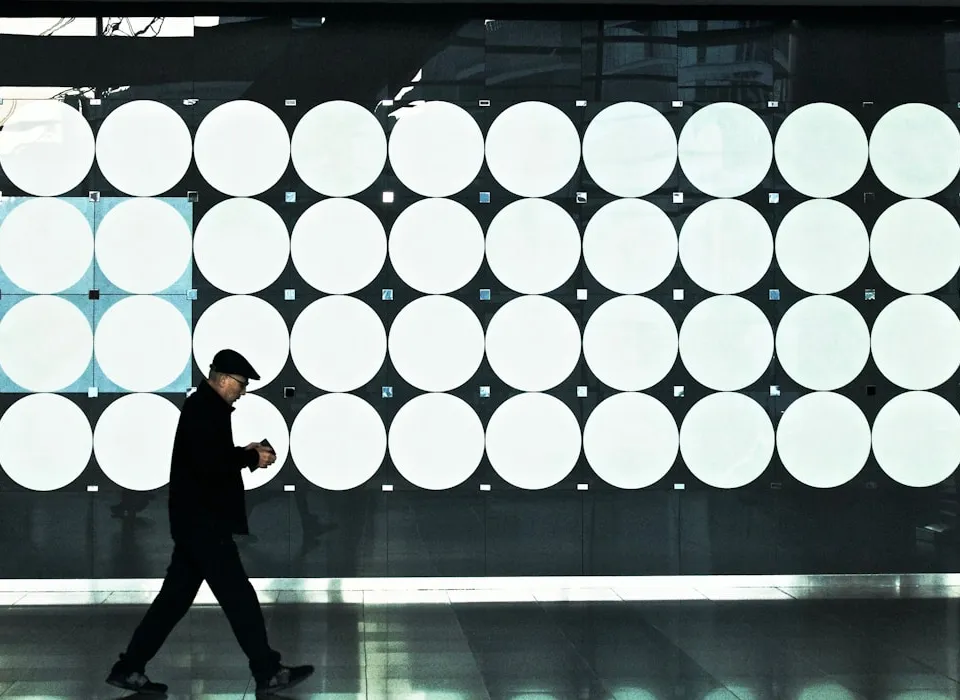 man walking near lights